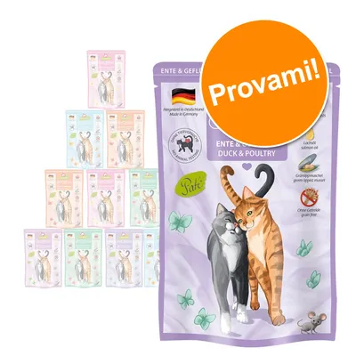 Confezioni di cibo per gatti con illustrazione di due gatti, testo visibile: 'ENTE & GEFLÜGEL', 'DUCK & POULTRY', 'Paté', 'Ohne Getreide', 'Provami!', bandiera tedesca e simbolo cruelty free.