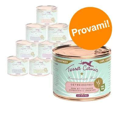 Set di lattine Terra Canis, visibile testo: 'Getreidefrei', 'Huhn mit Pastinaken, Brombeeren & Löwenzahn', 'Laktosefrei', bollino arancione con scritta 'Provami!'.