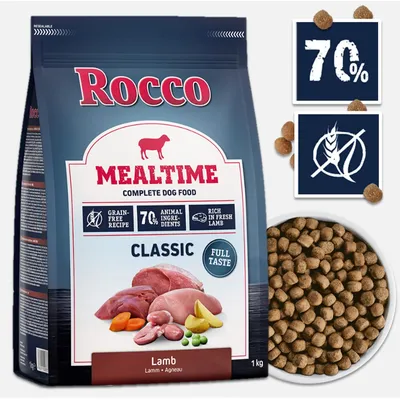 Rocco Mealtime Classic Lamb, karma dla psa 1 kg. Widoczne: 70% składników zwierzęcych, bez zbóż, bogata w świeżą jagnięcinę. Opakowanie oraz miska z suchą karmą.