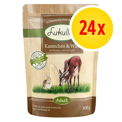 Lukullus Kaninchen & Wild Adult, 300 g, lot de 24. Texte visible : Rabbit & Game with brown rice, apple and linseed oil. Sceau : Ursprünglicher Geschmack. Illustration lapin et cerf.