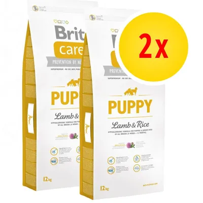 Lot de 2 sacs Brit Care Puppy Lamb & Rice, 12 kg chacun. Texte visible : hypoallergenic formula for puppies & junior dogs of all breeds (6 weeks–12 months).