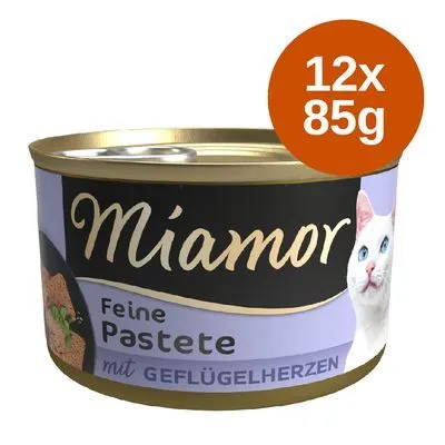 Miamor Feine Pastete mit Geflügelherzen, 12x85g. Blik kattenvoer met afbeelding van een witte kat en productnaam op het etiket.