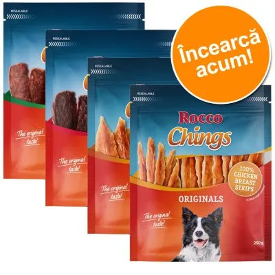 Pungi Rocco Chings Originals, 100% Chicken Breast Strips, 250g, cu text vizibil: „The original taste”, „Încearcă acum!” și imagine de câine pe ambalaj. Pungi Rocco Chings Originals, 100% Chicken Breast Strips, 250g, cu text vizibil: „The original taste”, „Încearcă acum!” și imagine de câine pe ambalaj.