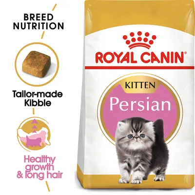 Корм для котят Royal Canin Persian Kitten. Видна гранула корма, надписи: Breed Nutrition, Tailor-made Kibble, Healthy growth & long hair. На упаковке изображён персидский котёнок.