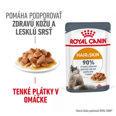 ROYAL CANIN Hair & Skin, tenké plátky v omáčke. Pomáha podporovať zdravú kožu a lesklú srsť. 90 % majiteľov pozorovalo zlepšenie po 3 týždňoch. Mačka pri miske s krmivom.