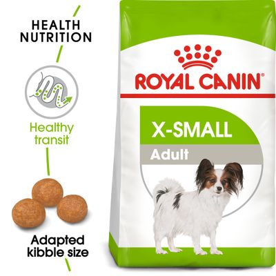 Упаковка корма Royal Canin X-Small Adult для очень маленьких собак до 4 кг. На упаковке изображена собака, видны надписи: Healthy Transit, Coat Condition, Very Palatable, Very Small Kibble.