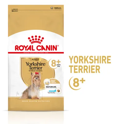 Hrană uscată Royal Canin Adult Yorkshire Terrier 8+ ani, ambalaj cu imagine câine, text vizibil: Healthy Ageing Complex, Healthy Skin & Coat, crochetă adaptată.