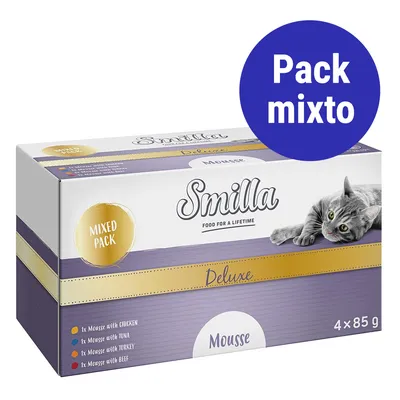 Caja de Smilla Deluxe Mousse para gatos, pack mixto 4x85 g. Incluye mousse con pollo, atún, pavo y ternera. Texto visible: 'Pack mixto', 'Mixed Pack', 'Food for a lifetime'.