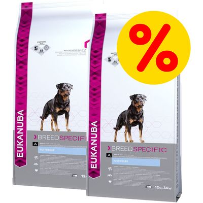 To sække Eukanuba Breed Specific Rottweiler tørfoder, hver 12 kg. Stor gul procent-tegn viser tilbud eller rabat.