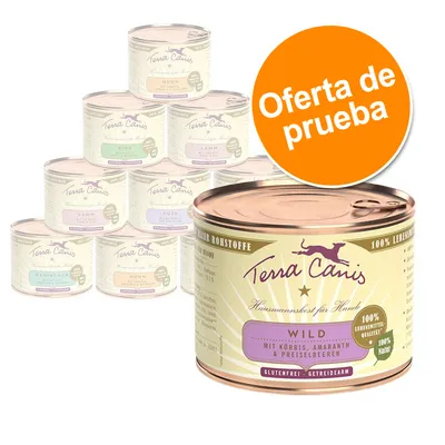 Latas de comida para perros Terra Canis con diferentes variedades. Texto visible: 'Oferta de prueba', 'Wild mit Kürbis, Amaranth & Preiselbeeren', '100 % Lebensmittelqualität', 'Glutenfrei'. Latas de comida para perros Terra Canis con diferentes variedades. Texto visible: 'Oferta de prueba', 'Wild mit Kürbis, Amaranth & Preiselbeeren', '100 % Lebensmittelqualität', 'Glutenfrei'.