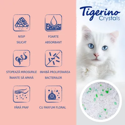 Tigerino Crystals. Nisip silicat, foarte absorbant, stopează mirosurile înainte să apară, inhibă proliferarea bacteriilor, fără praf, cu parfum floral. Imagine cu granule albe și verzi.