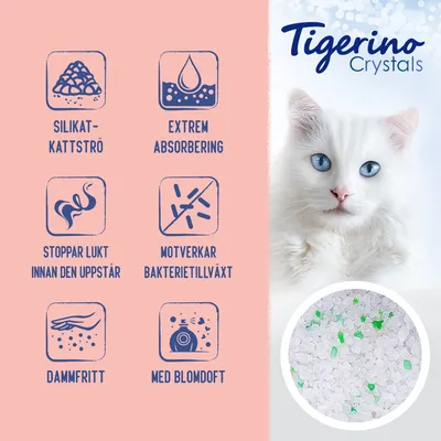 Tigerino Crystals silikatkattströ: extrem absorbering, stoppar lukt innan den uppstår, motverkar bakterietillväxt, dammfritt, med blomdoft. Bild på strö med gröna bitar.