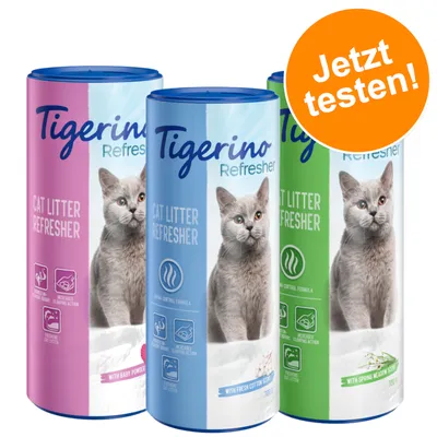 Tigerino Cat Litter Refresher in drei Varianten: Baby Powder, Fresh Cotton und Spring Meadow. Hinweis 'Jetzt testen!' auf orangefarbenem Kreis.