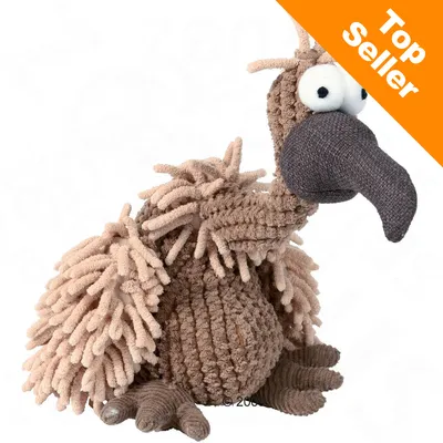 Top Seller. Mjuk leksak i form av en fågel med beige och bruna stickade material, stora ögon och lång näbb.