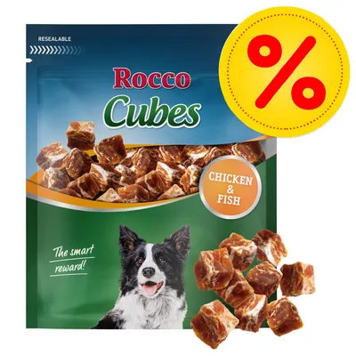 Rocco Cubes CHICKEN & FISH, sáček s kostkami pamlsků pro psy, nápis The smart reward!, žlutý symbol procenta v rohu Rocco Cubes CHICKEN & FISH, sáček s kostkami pamlsků pro psy, nápis The smart reward!, žlutý symbol procenta v rohu