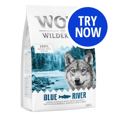 Bag labelled '100% grain-free recipe', 'Blue River', 'fresh chicken meat with salmon, wild berries, roots and wild herbs', 400g. Blue circle with 'Try Now'.