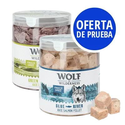 Dos botes de Wolf of Wilderness Freeze Dried, sabores Green Fields y Blue River 100% Salmon Fillet. Etiqueta azul: OFERTA DE PRUEBA.