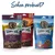 Trois sachets de friandises pour chien Happy Dog : Soft Snack Ireland (saumon et lapin), Soft Snack Africa (autruche), Meat Snack Allgäu (bœuf). Textes en allemand visibles sur les emballages.