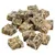 Several dried, square-shaped treats with a marbled texture and natural colours, arranged in a pile on a white background.