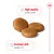 Kibble pieces shown with highlighted features: high-quality protein content and enriched with vitamins C and E.