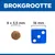 Brokgrootte: brok van 9 x 3,5 mm naast een dobbelsteen van 16 mm ter vergelijking.