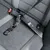 Safety belt adapter for dogs, attached to a car seat with ISOFIX system and carabiner.