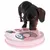 Dog playing with pink intelligence toy featuring various compartments and sliding mechanisms.