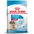 Royal Canin Starter Mother & Babydog Medium, 1–2 months, adult weight 11–25 kg, rehydratable kibble, information on health and immune system on the packaging.