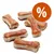 Snack em forma de osso com cobertura castanha, vários exemplares visíveis. Círculo laranja com símbolo de percentagem (%) indica promoção ou desconto.