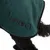 kooa. Dark green towel with black border, visible on a black dog.