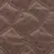 Brown, quilted material with embossed paw patterns and decorative perforations.