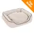Rektangulär beige hund- eller kattbädd i tyg med upphöjda kanter. Orange hörn med vit text: Top Seller. Rektangulär beige hund- eller kattbädd i tyg med upphöjda kanter. Orange hörn med vit text: Top Seller.