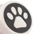 Black paw shape on white background, part of a product design.