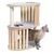 Arbre à chat en bois clair avec deux plateformes ovales recouvertes de feutre gris, poteau à griffer en sisal, un chat adulte beige et gris debout à côté de la structure.
