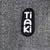 Tiaki-Logo auf grauem, gewebtem Stoff.