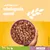Bowl of small bites with wholegrain cereal, showing a serving suggestion for a mixer product. Text highlights 'small bites with wholegrain cereal'.