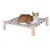 Gestreepte hangmat met houten frame, met een rood-witte kat erop. Product voor ontspanning of slaap voor huisdieren.