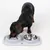 Feeding bowl set with non-slip mat, consisting of a stainless steel bowl and a bowl with anti-gulping function. Dog eating from the anti-gulping bowl.