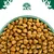 Bowl with brown dry food pieces, above it a green tree logo with a dog and a cat. Bowl with brown dry food pieces, above it a green tree logo with a dog and a cat.
