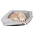 Grey, padded pet bed with raised side walls and soft lying surface.