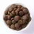 Cuenco con croquetas de pienso marrones y redondas. La imagen del producto muestra la forma y el tamaño de las croquetas. Cuenco con croquetas de pienso marrones y redondas. La imagen del producto muestra la forma y el tamaño de las croquetas.