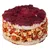 Snack per pet a base di gallette di riso pressato, pezzi di verdura rossa e bianca essiccati, con uno strato di polvere rossa sopra.