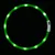 Groene LED-lichtgevende ring met witte sluiting en Trixie-logo, zichtbaar lichtgevend in het donker.