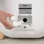 kooa Automatic Cat Toilet. Hand showing replacement of a component on the device. CE marking and model number M600 visible.