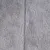 Close-up of grey, soft fabric with fluffy texture.