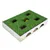 Toy box with green grass carpet and several openings, visible yellow ball underneath. Cardboard box with grass design on the sides.