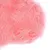 Nahaufnahme von rosa Kunstfell mit flauschiger Textur.