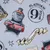 Motifs imprimés : train, texte 'Platform 9 3/4', bannière 'Hogwarts', éléments inspirés de l’univers Harry Potter visibles sur le tissu.
