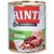 Lata de comida para perros Rinti Kennerfleisch, texto visible: MIT WILD, NEU noch mehr natürliche Fleischstücke. Imagen de trozos de carne en la etiqueta.