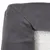 Close-up van grijze stof met witte, zachte voering. Detailweergave van een hoek van een product.